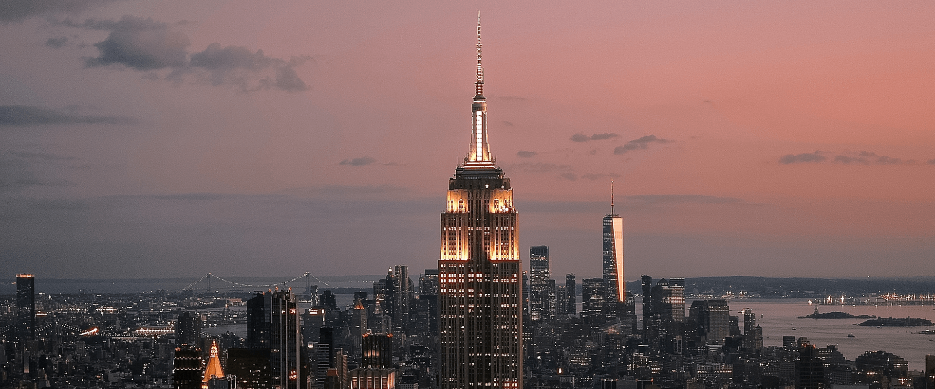 a city skyline with a tall building