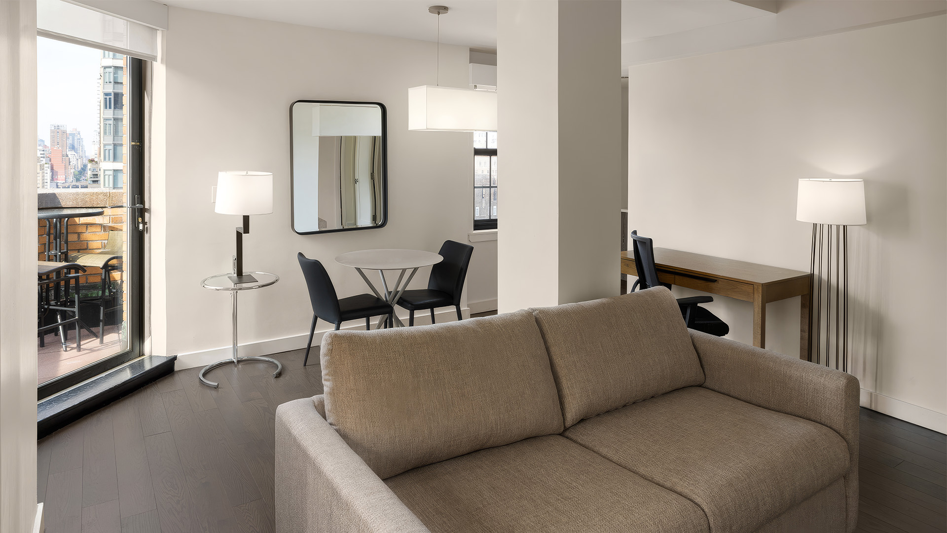 a living room with a couch and table