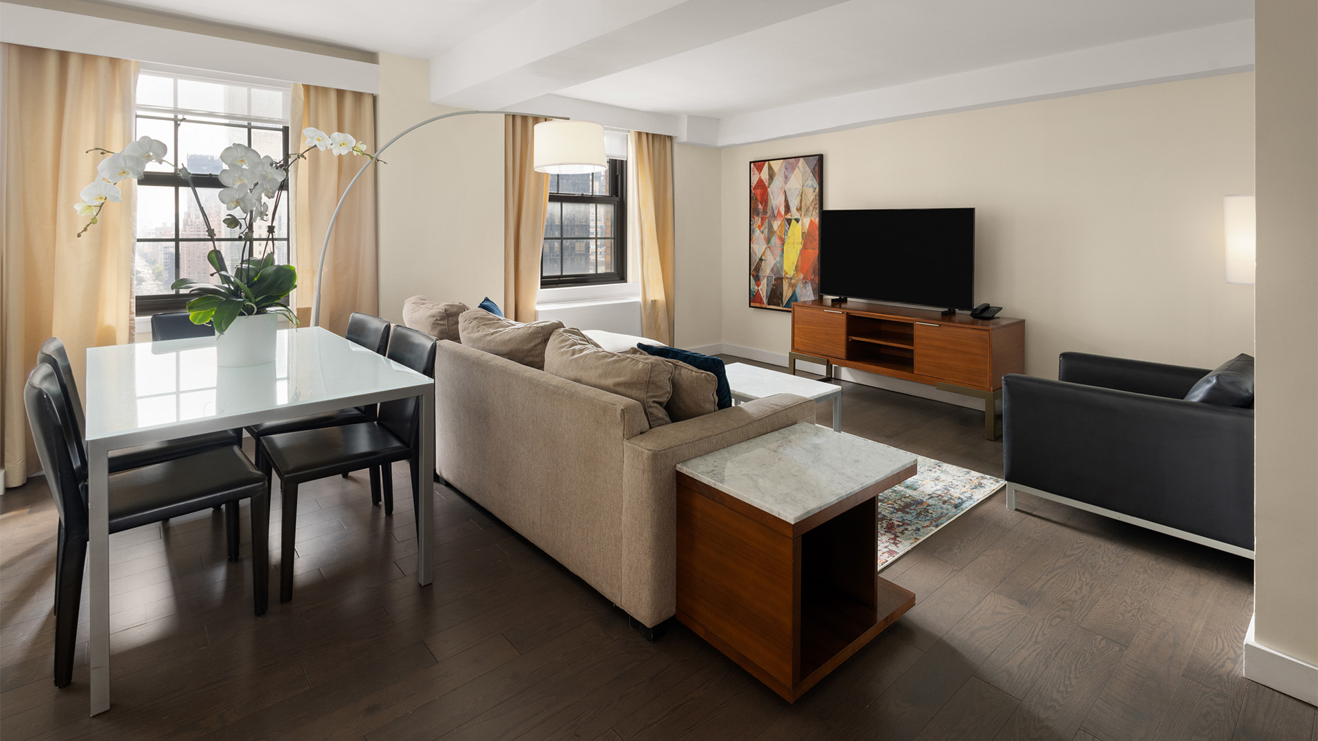 a living room with a couch and a tv