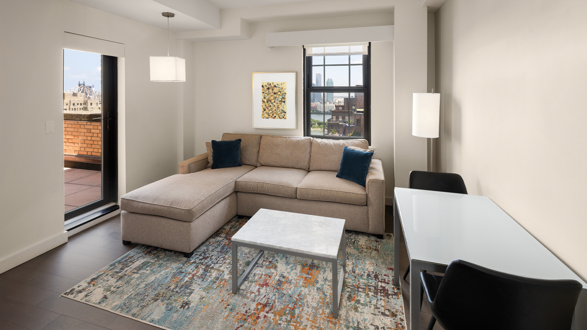 a living room with a couch and table
