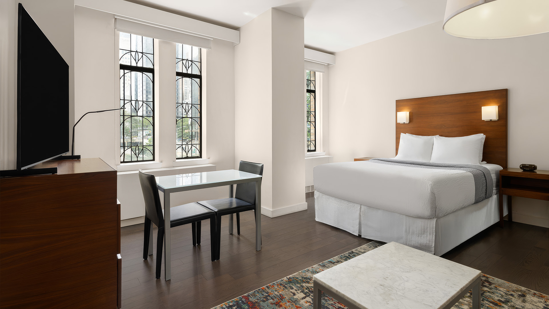 a room with a bed and a table