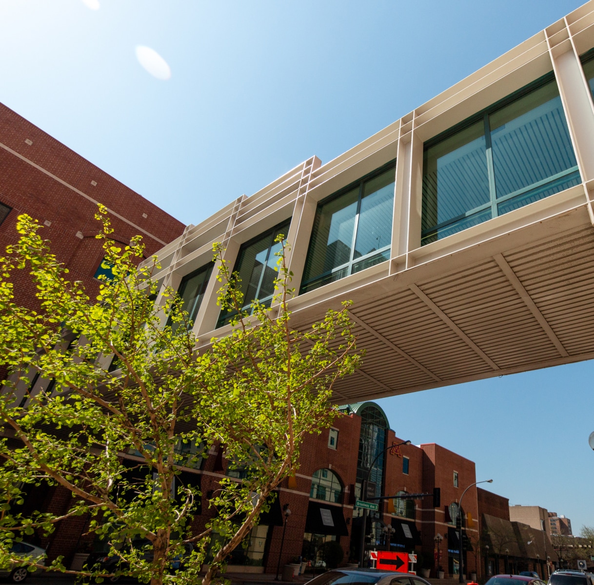 a building with a bridge over a street