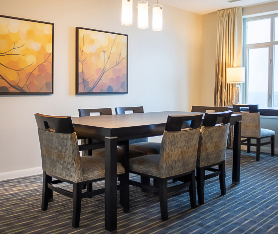 a room with a table and chairs
