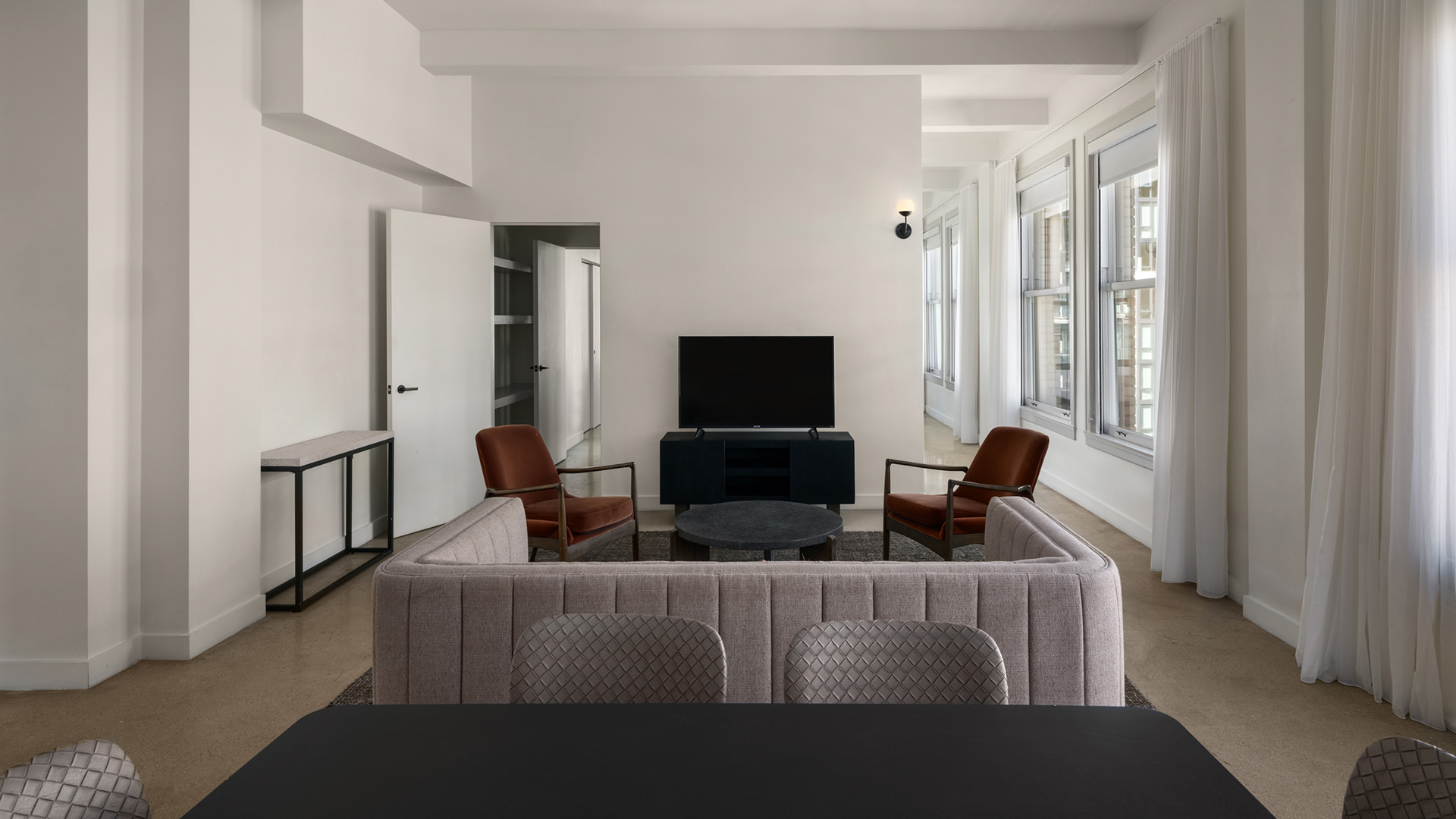 a room with a television and a couch