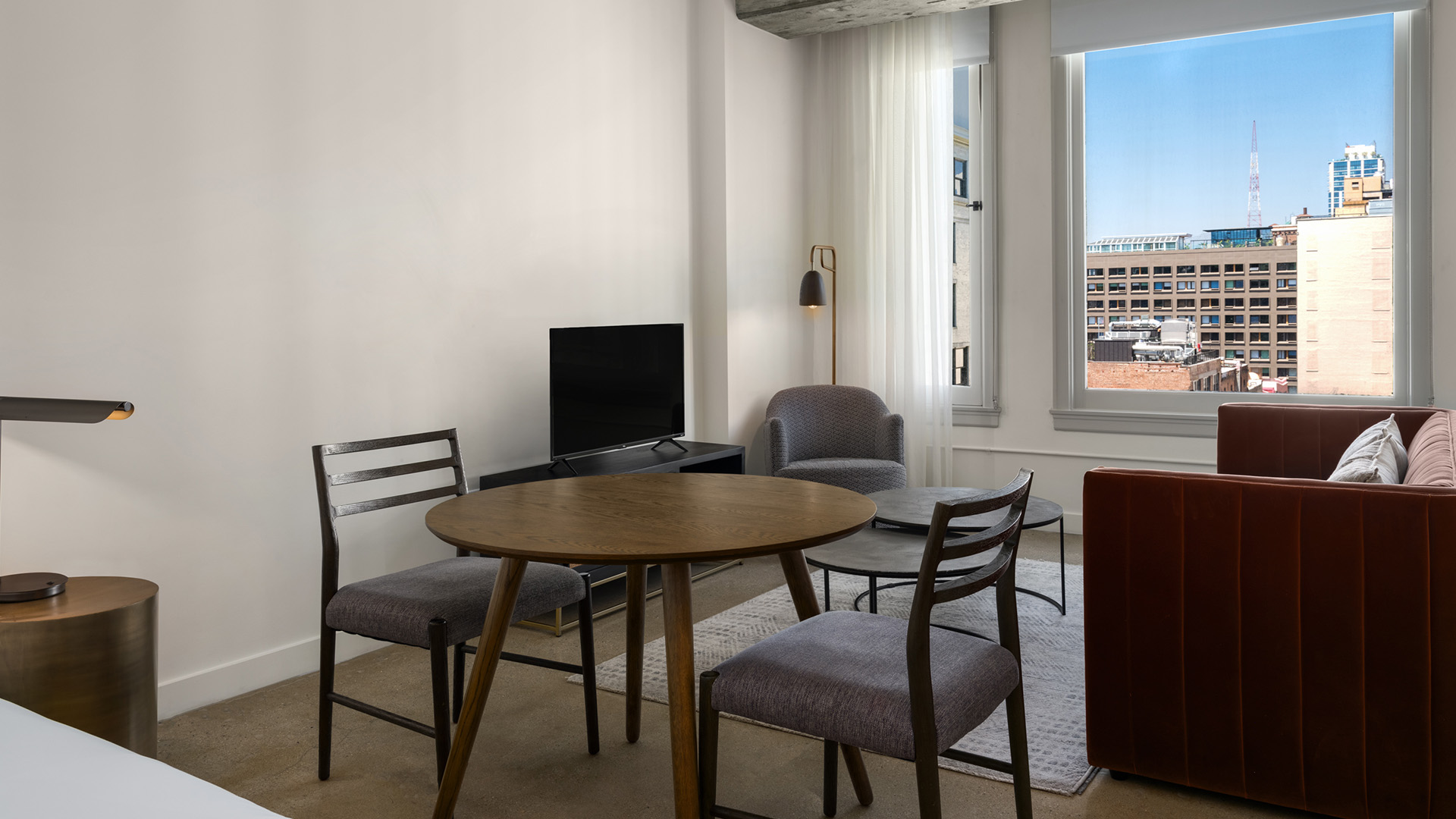 a room with a table and chairs