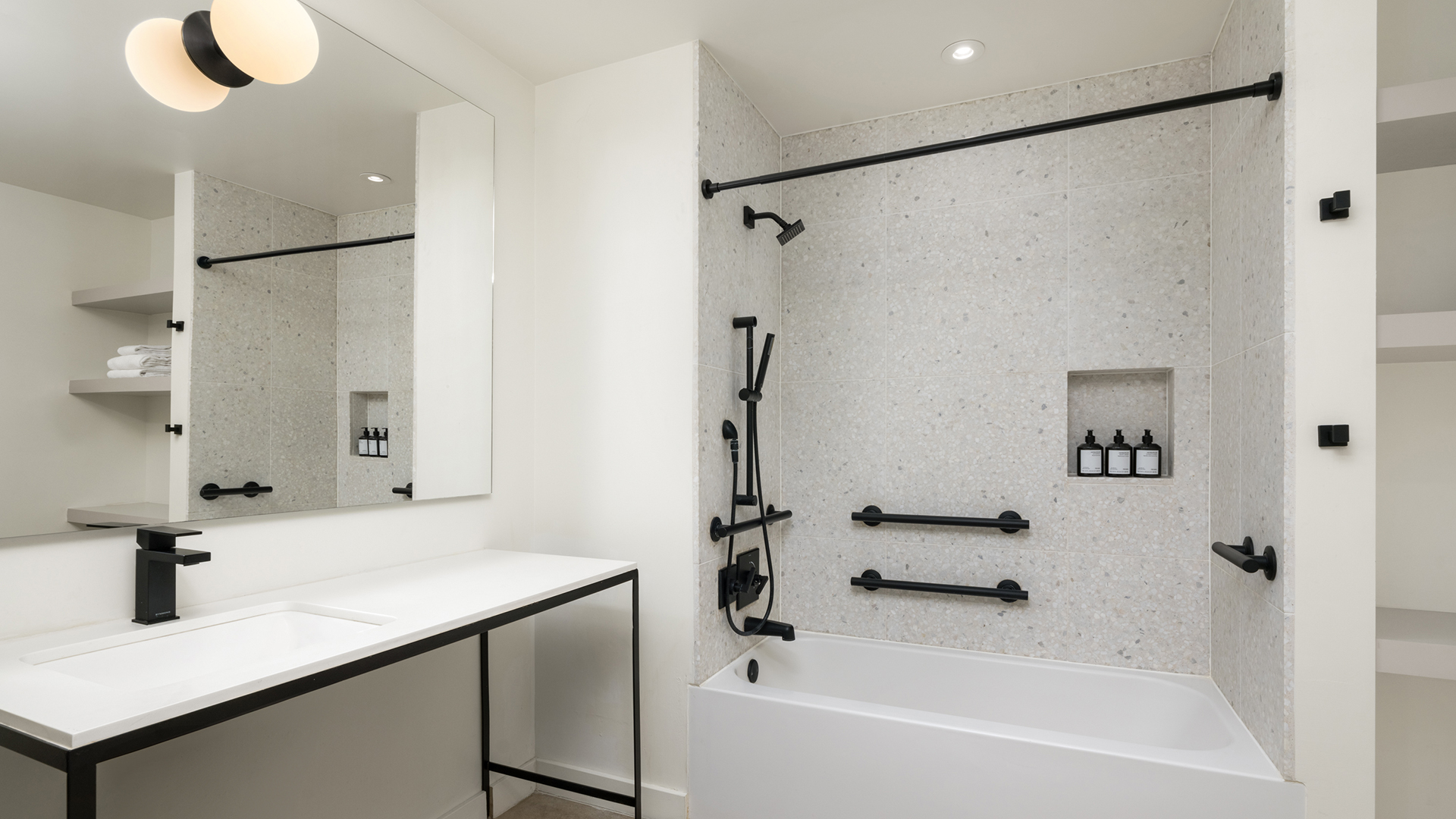 a bathroom with a bathtub and a sink