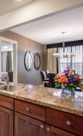 a kitchen with a marble countertop