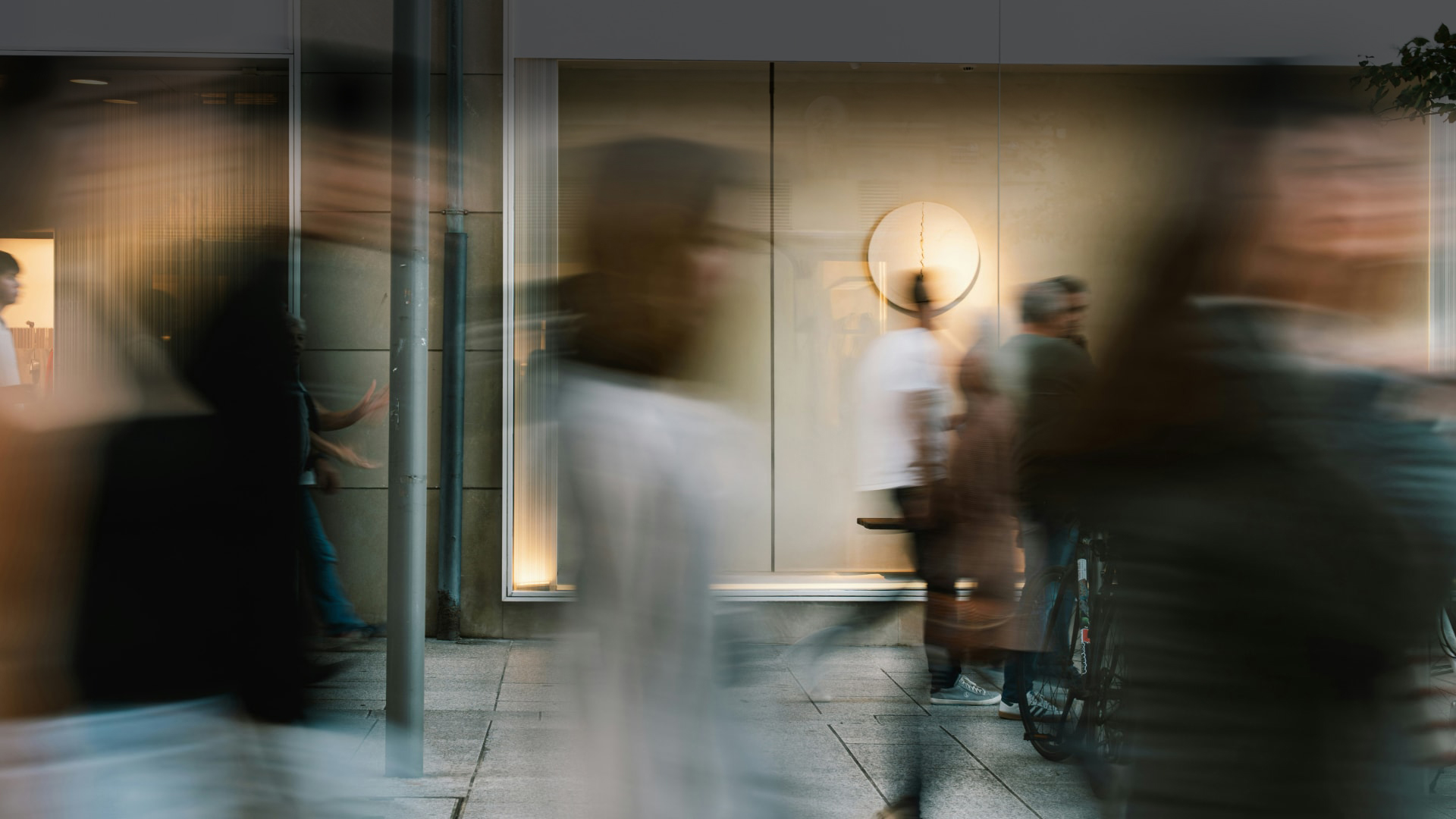 a group of people walking in a city
