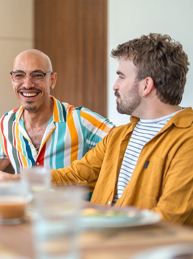 two men sitting at a table