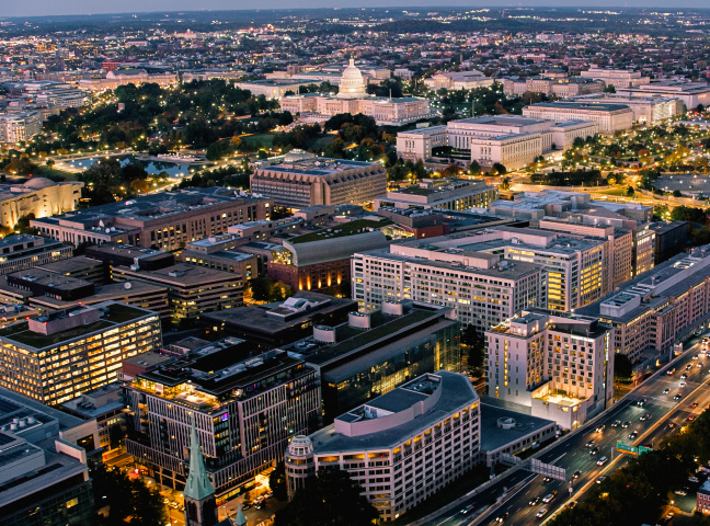 a city with many buildings and a capitol building