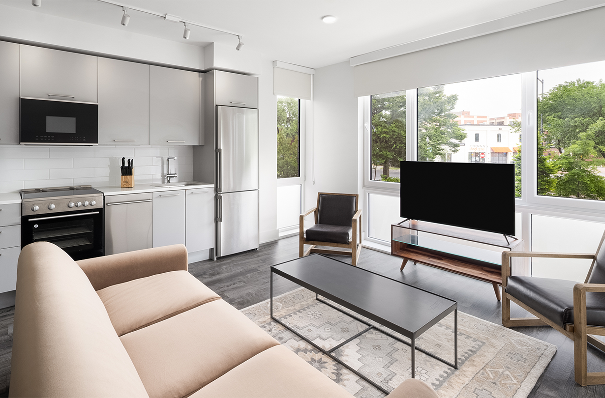 a living room with a couch and a tv