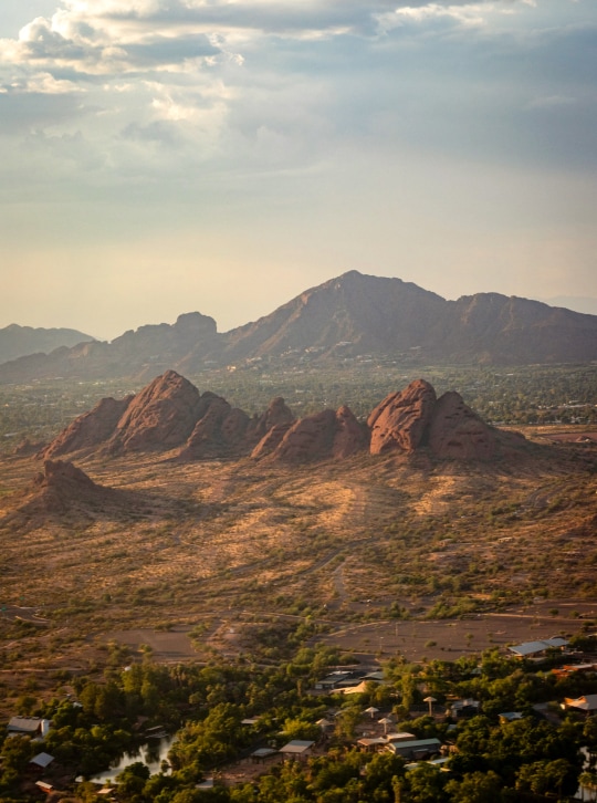 a landscape with mountains and trees