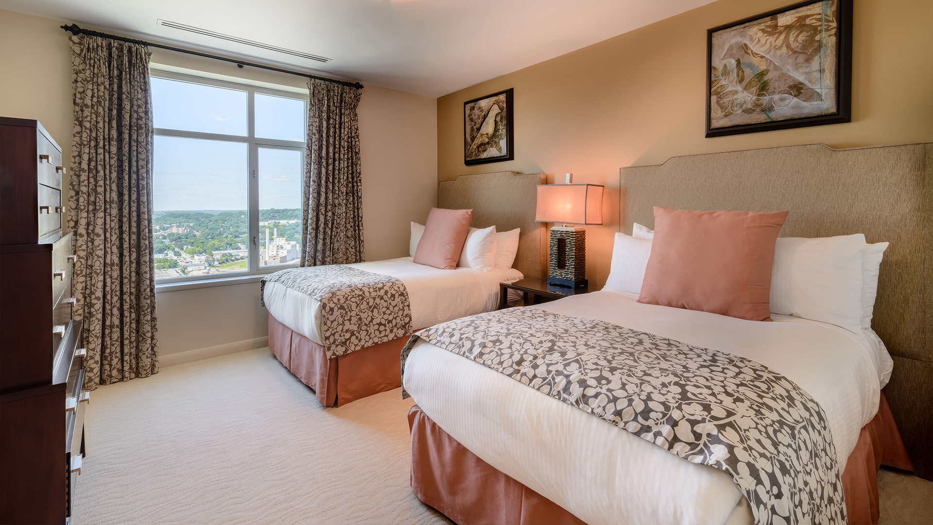 a bedroom with two beds