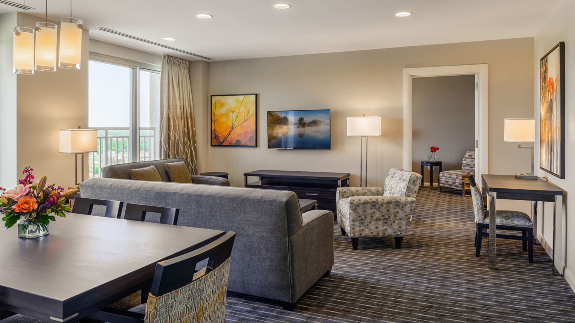 a room with couches and chairs