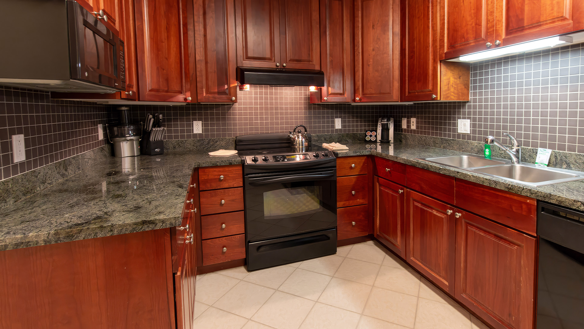 a kitchen with wood cabinets and black stove