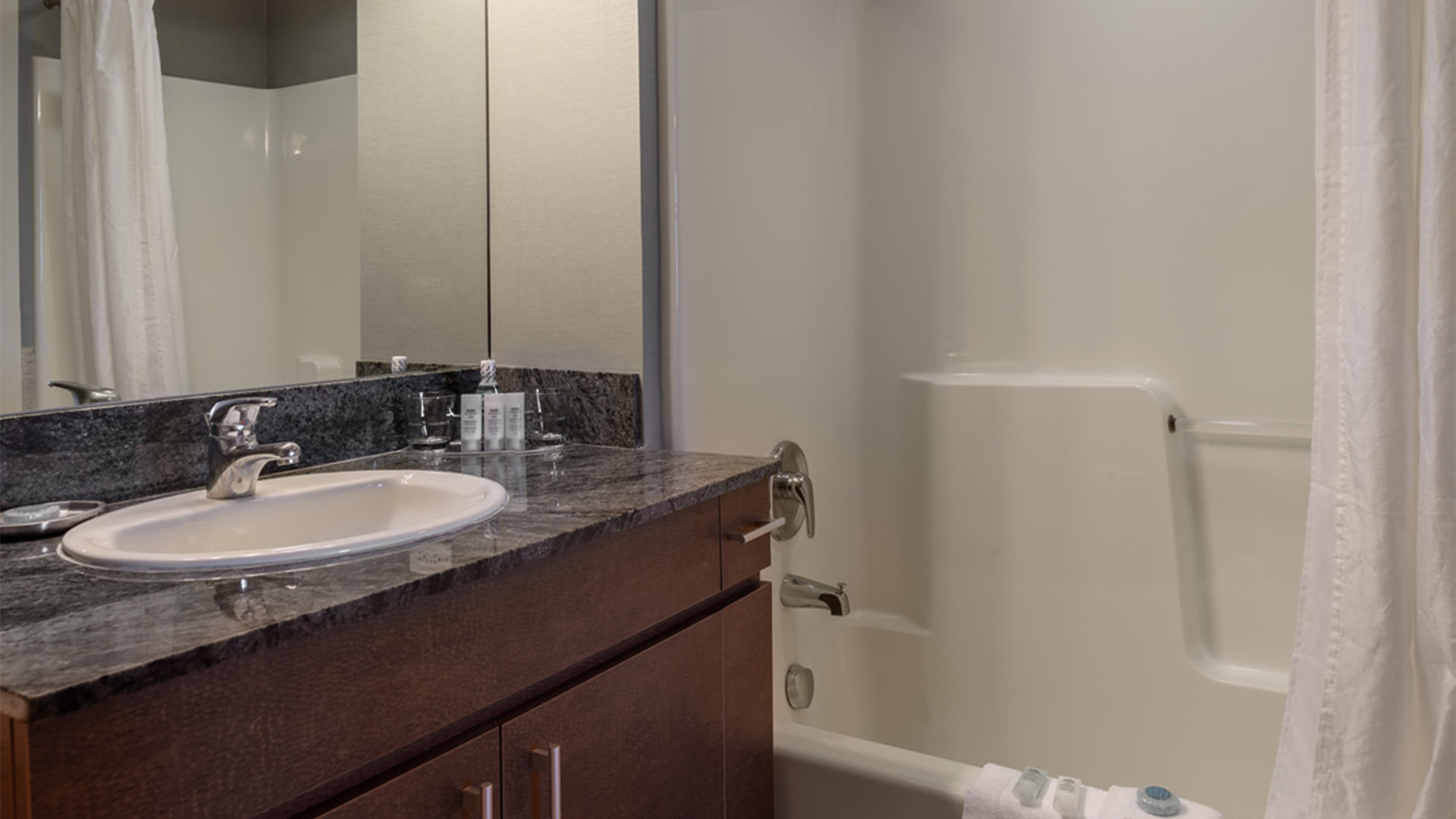a bathroom with a sink and bathtub