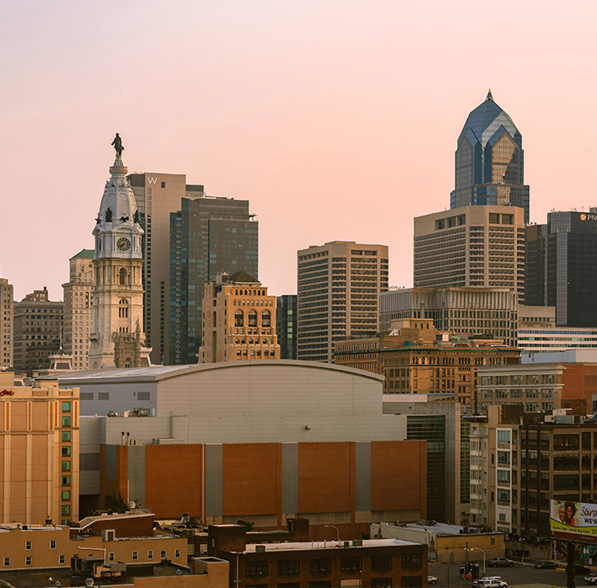 a city skyline with tall buildings