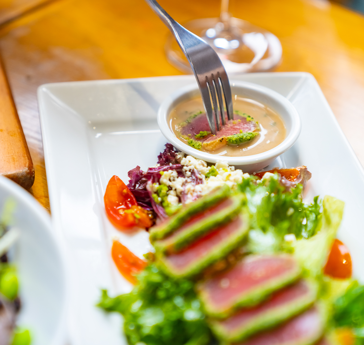 a fork in a plate of food