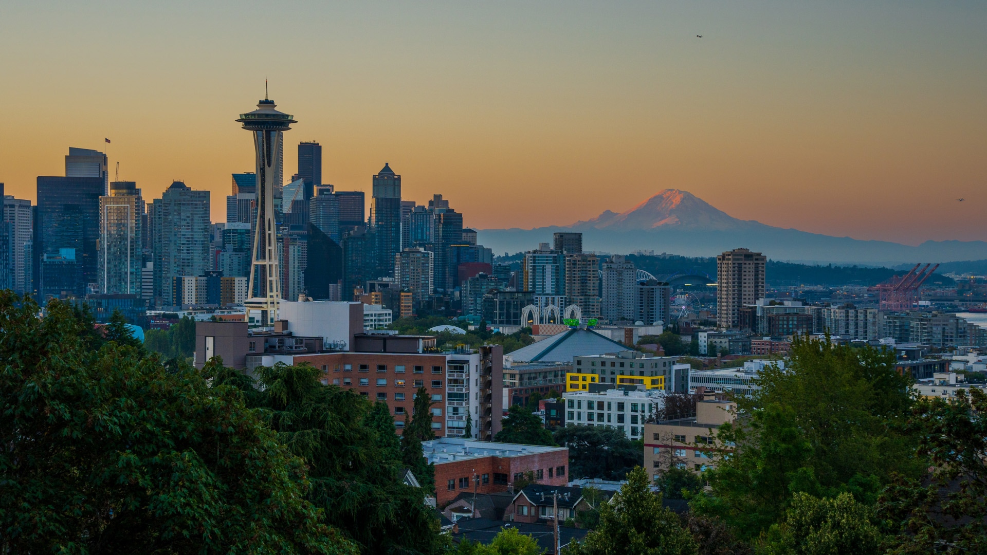 a city with a mountain in the background