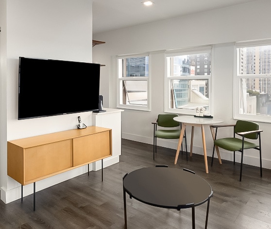 a room with a television and a table