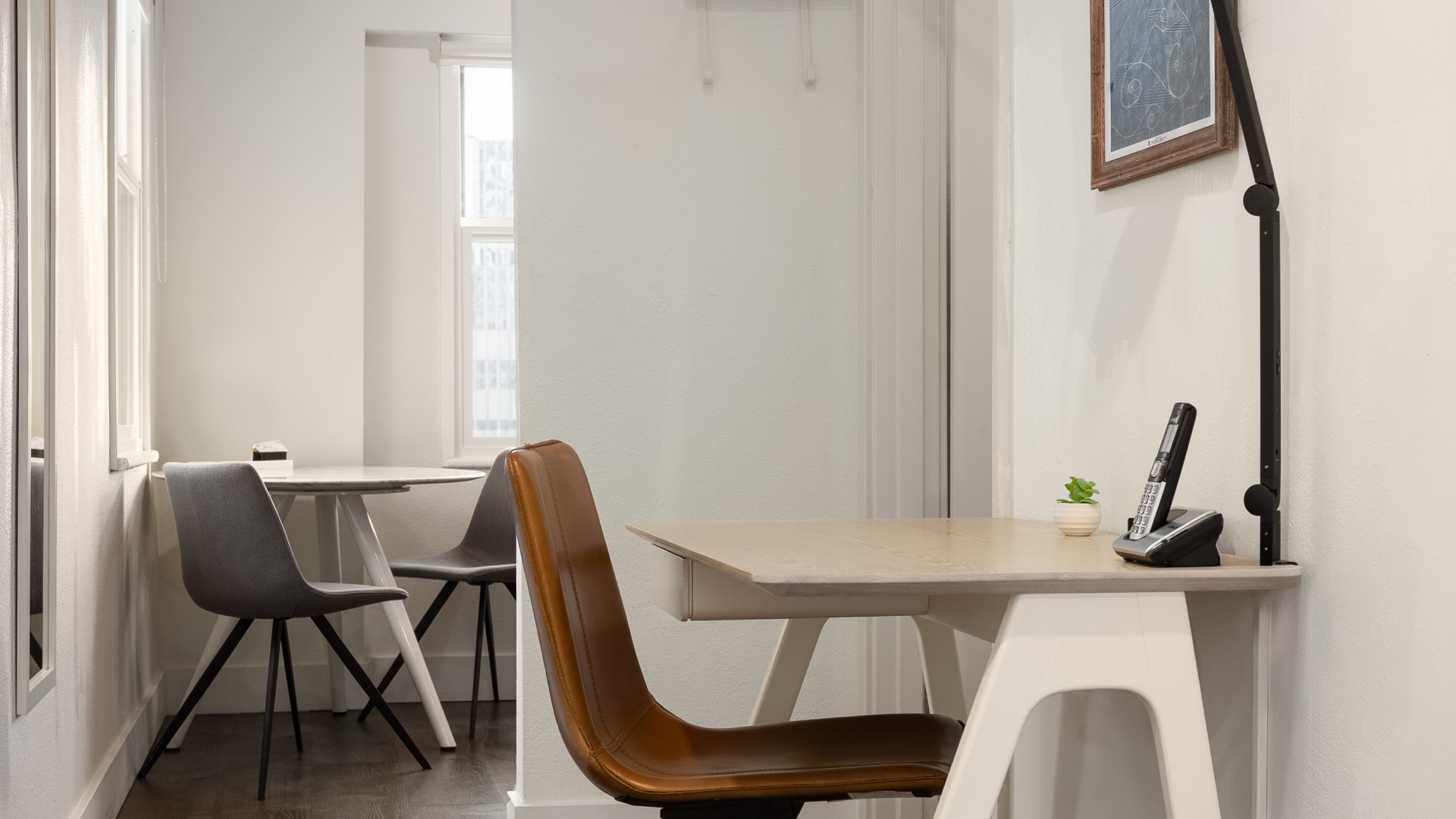 a table and chair in a room