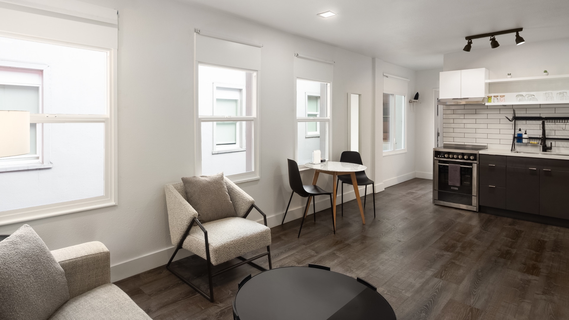 a room with a table and chairs