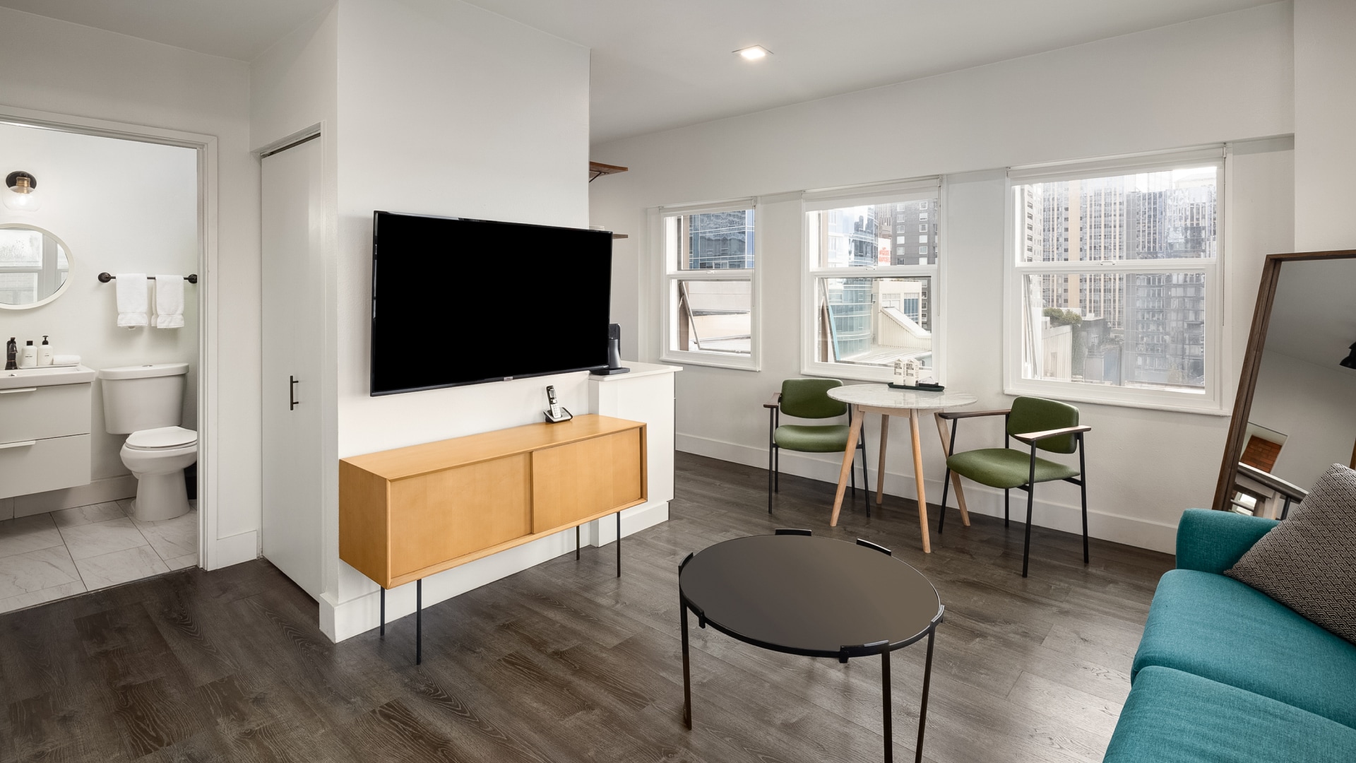 a room with a television and a table