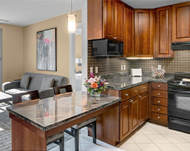a kitchen with a marble countertop