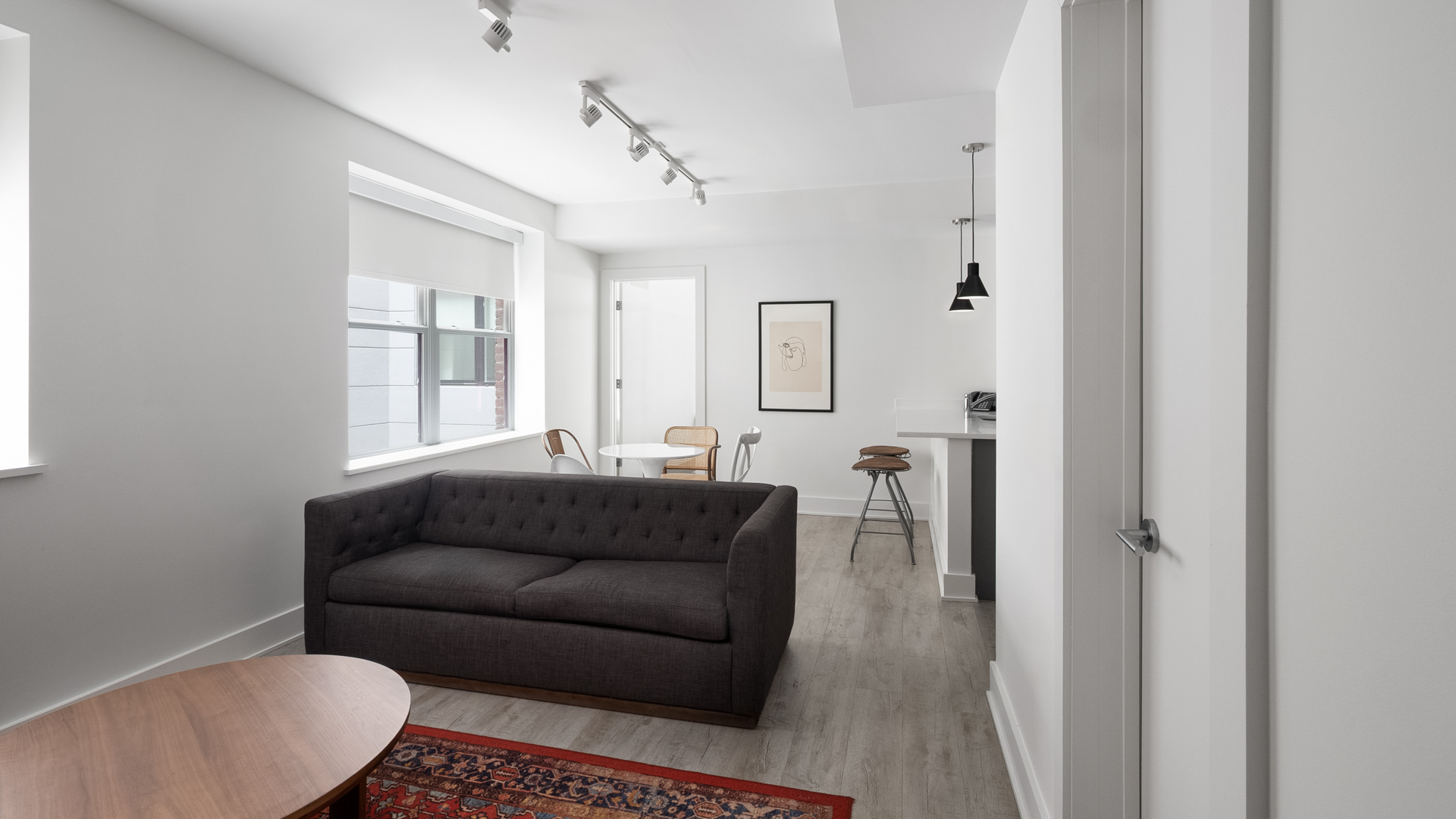 a living room with a couch and a table