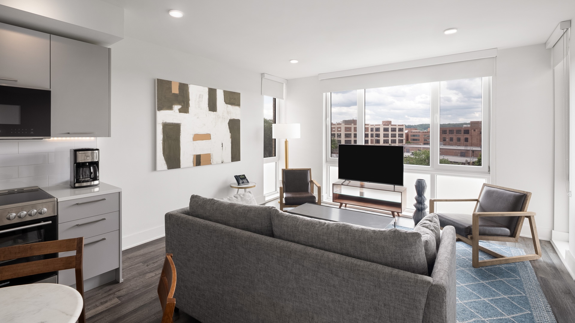 a living room with a couch and a television