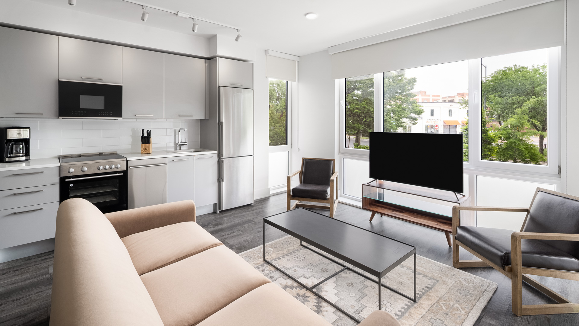 a living room with a couch and a tv
