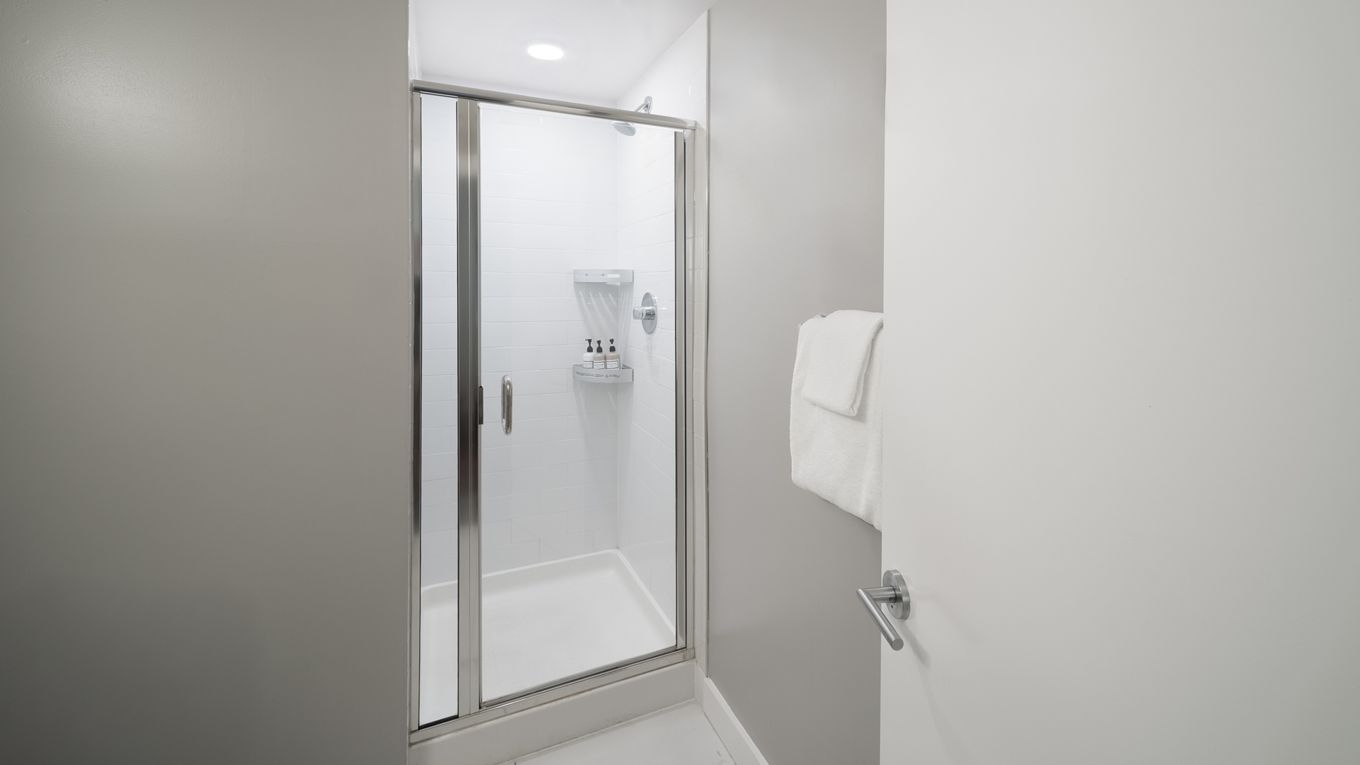a shower with a glass door