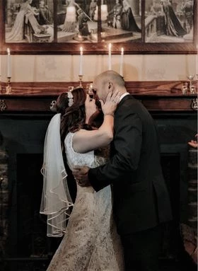 a man and woman kissing