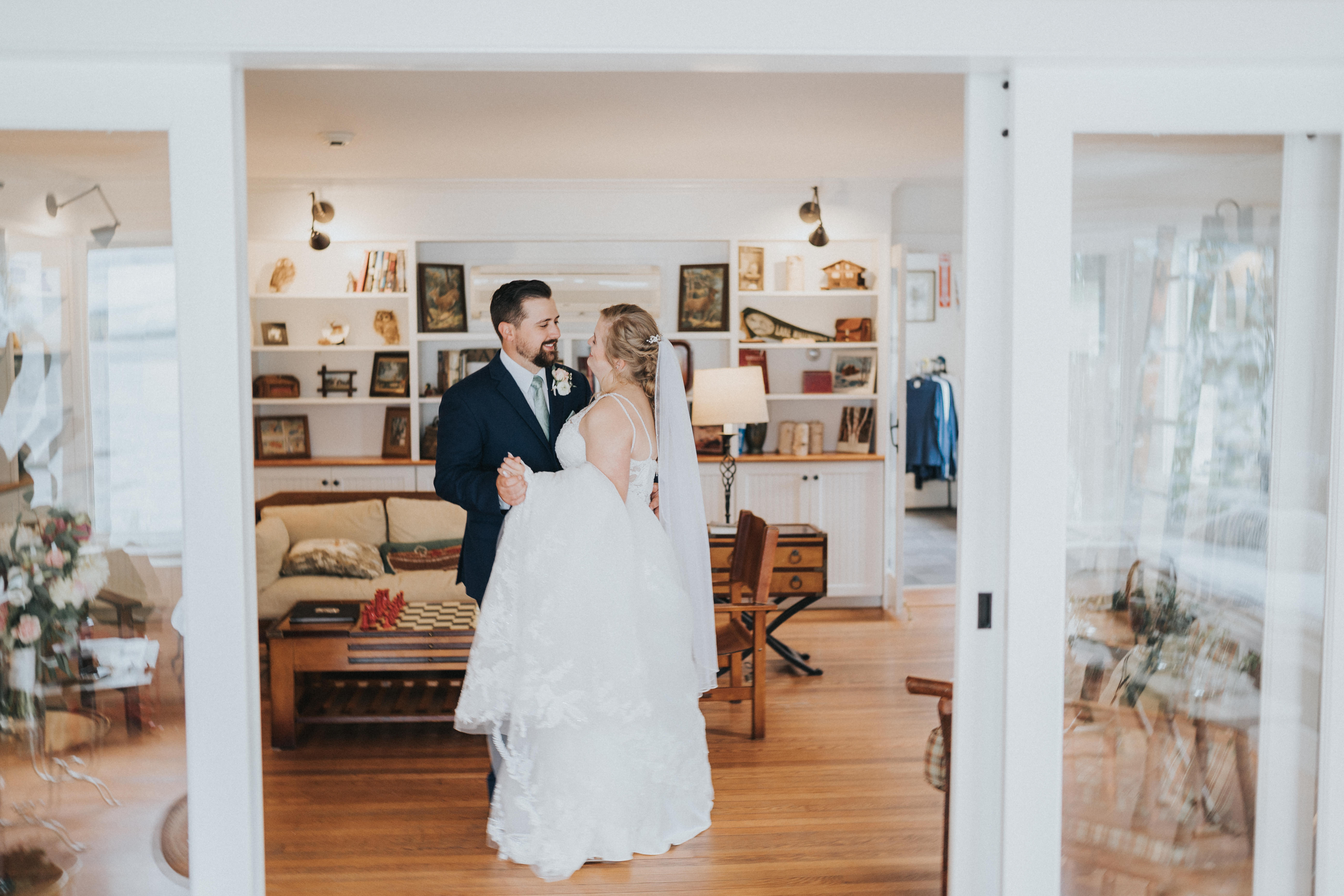 a man and woman in a white dress and a suit