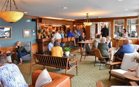 a group of people sitting in a room