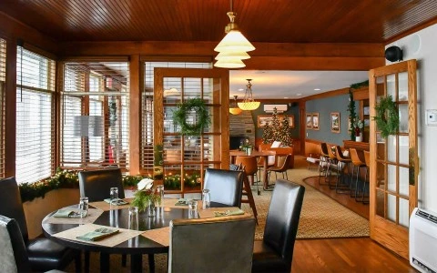 a room with a table and chairs
