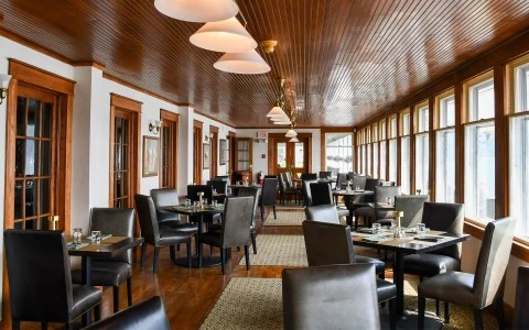 a room with tables and chairs