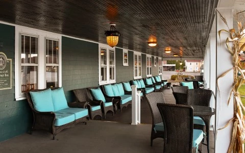 a group of chairs on a porch