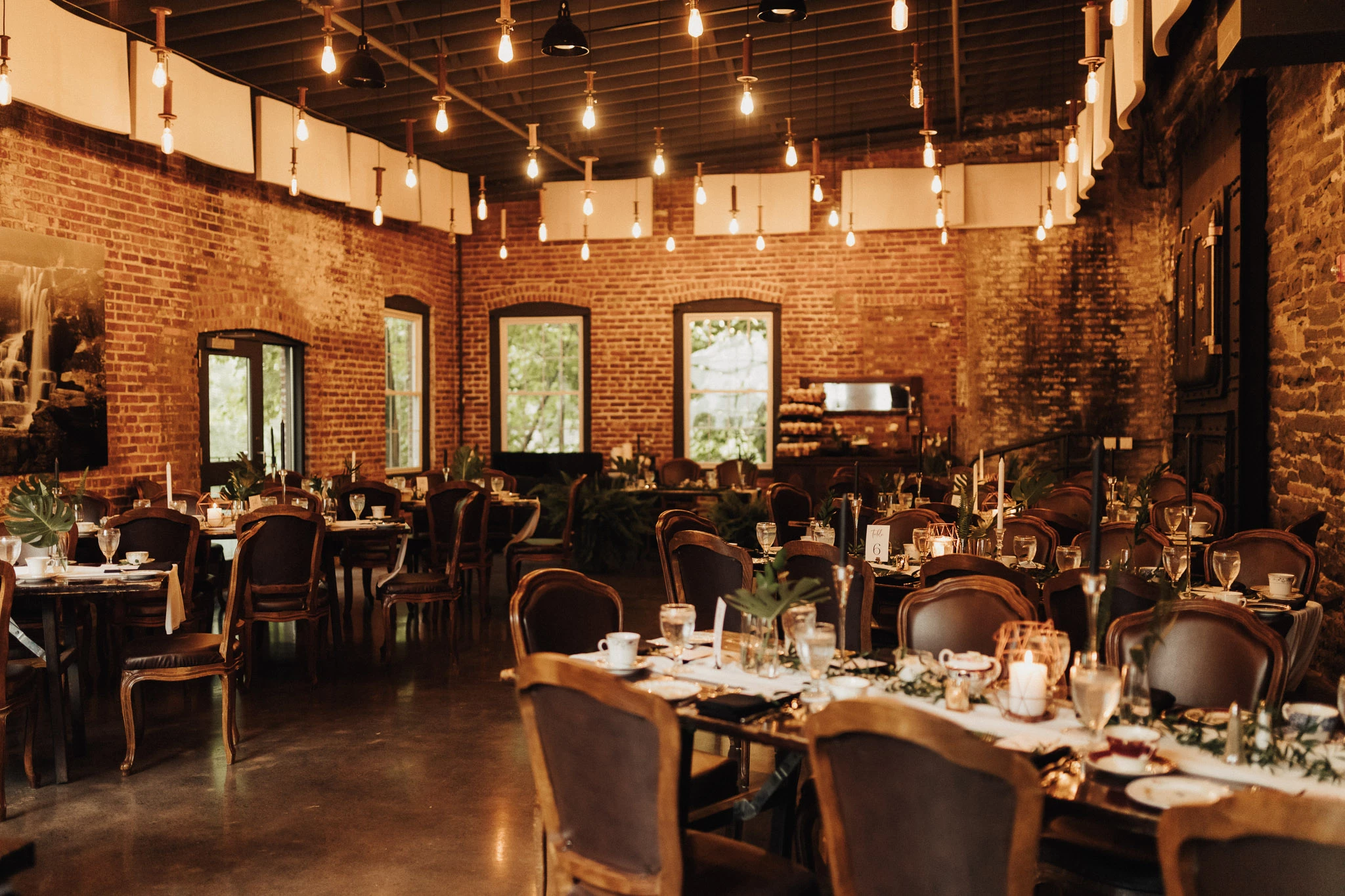 a room with tables and chairs