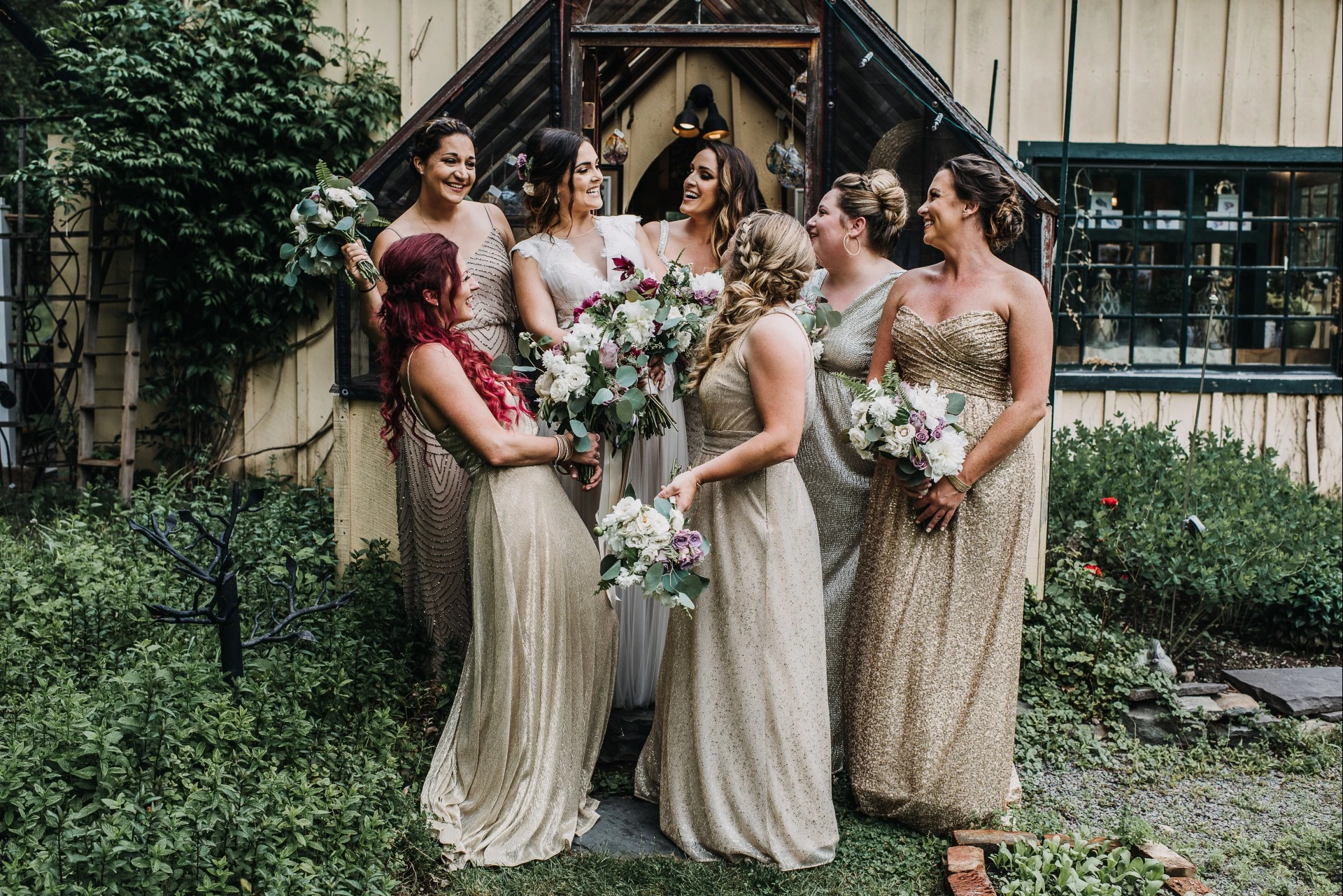 a group of women in dresses