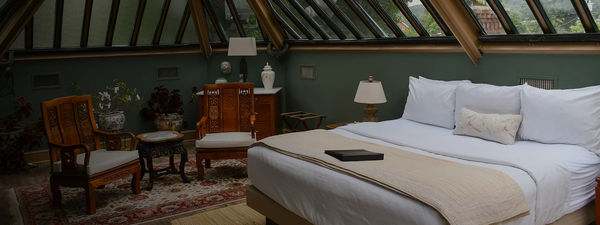 a room with a bed and a chair