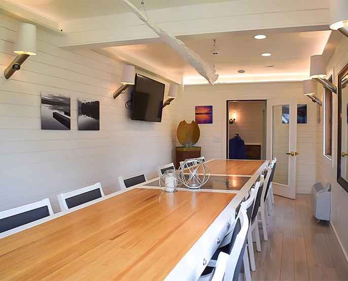 a room with a table and chairs