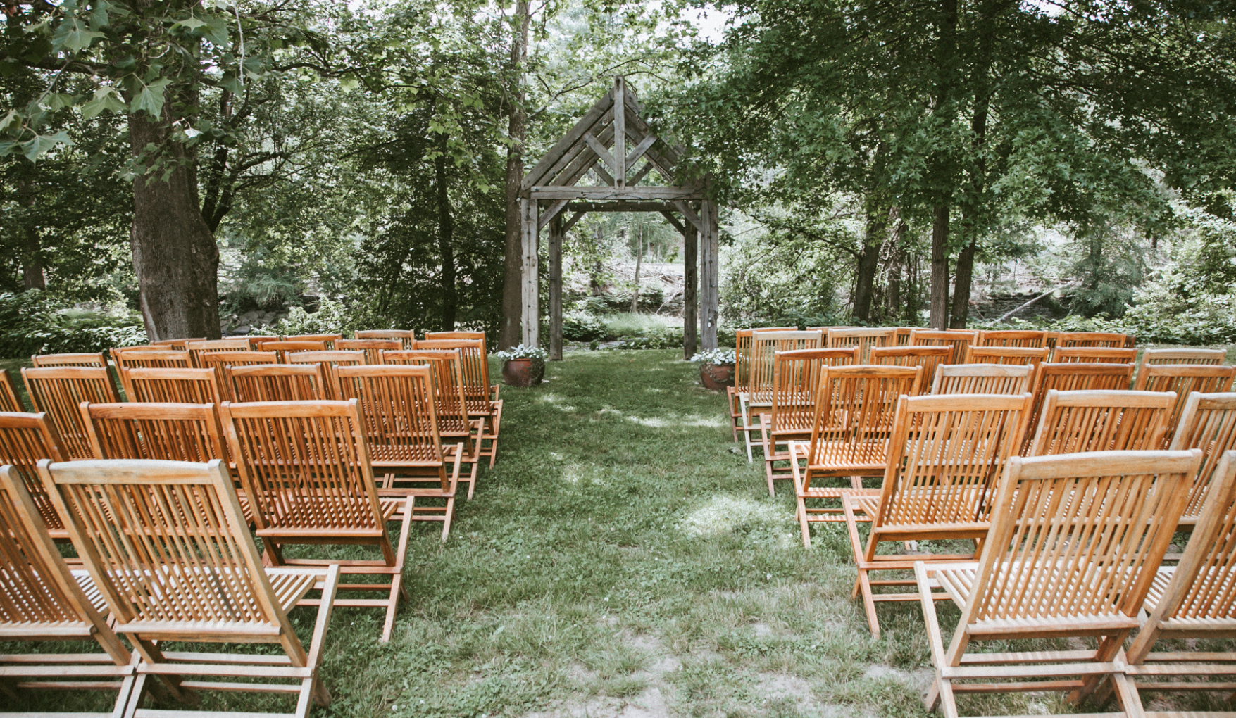 a group of chairs in a field