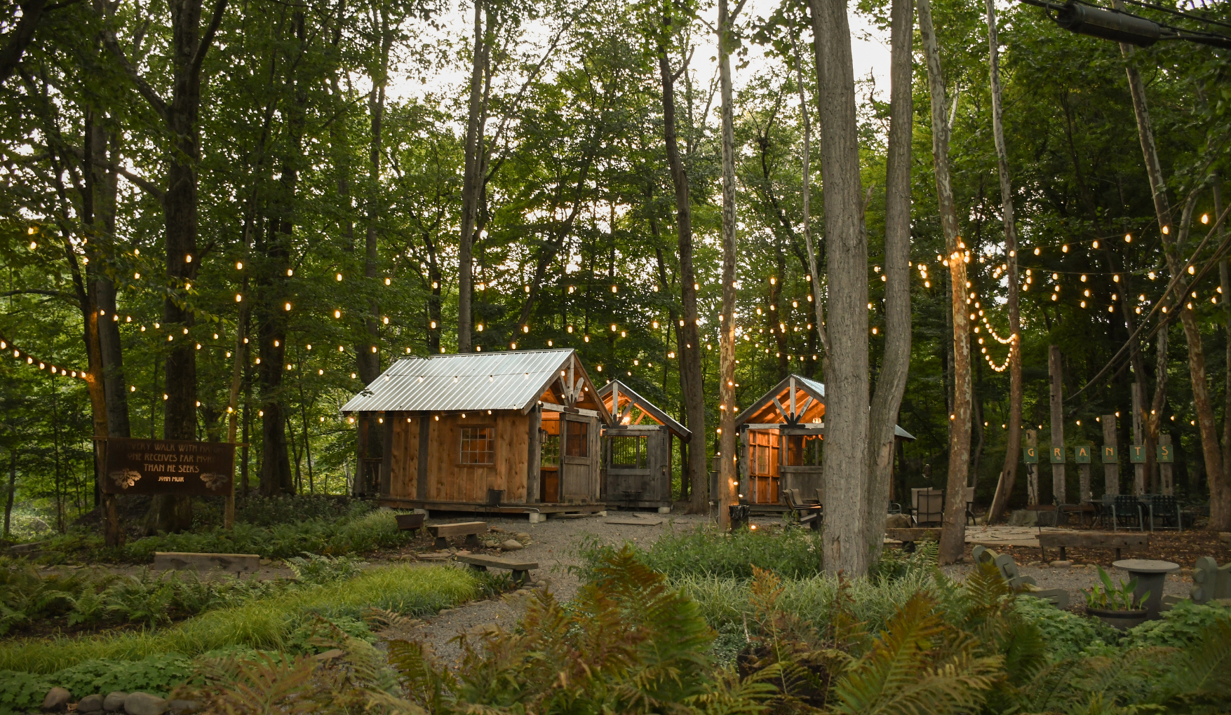 a small wooden houses in the woods