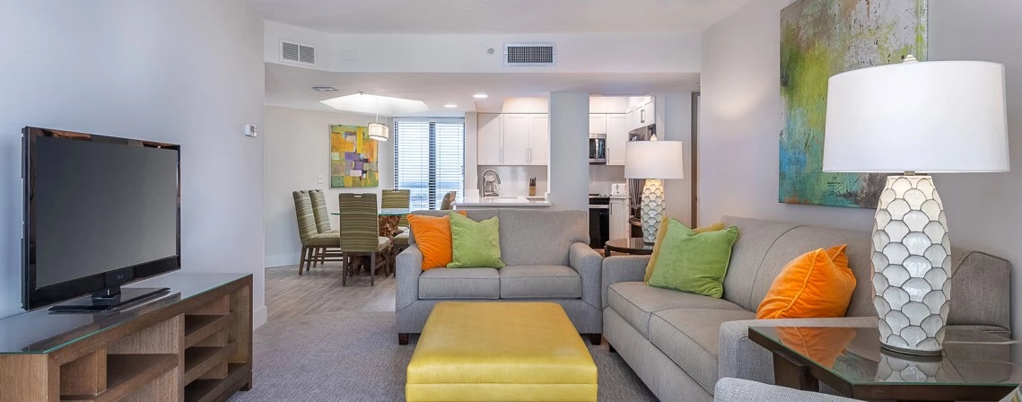 a living room with couches and a table