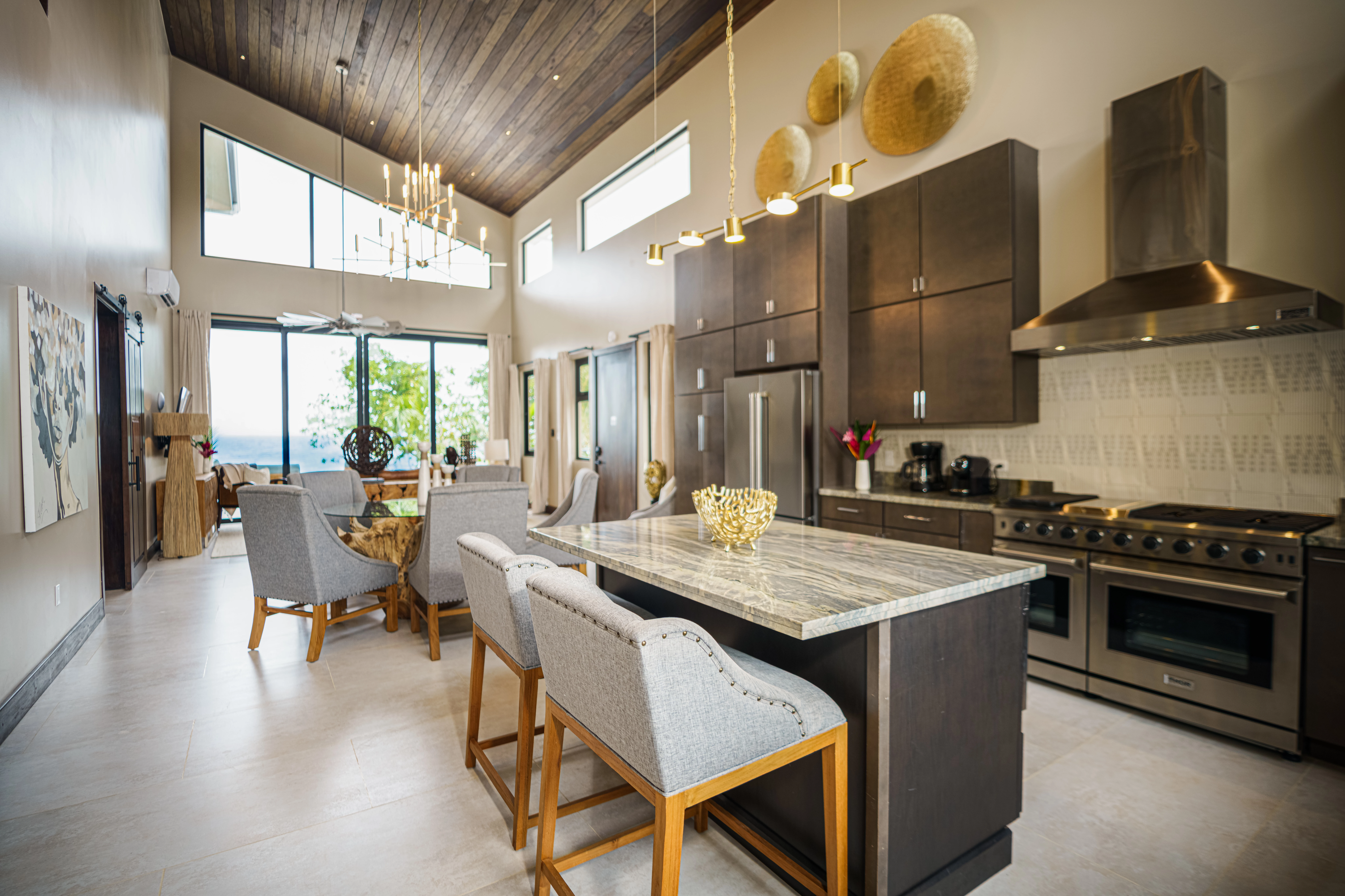 a kitchen with a table and chairs