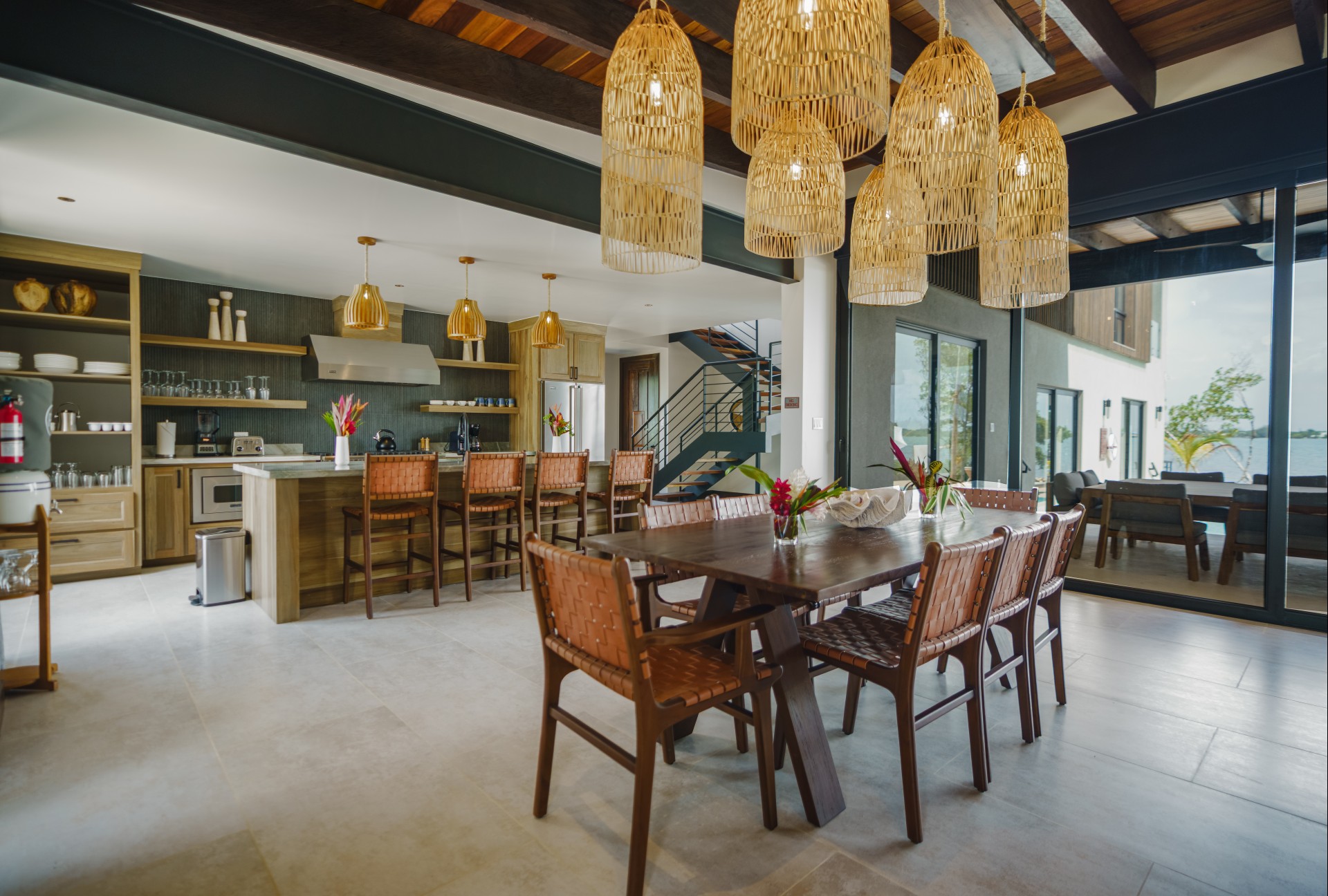 a dining room with a table and chairs