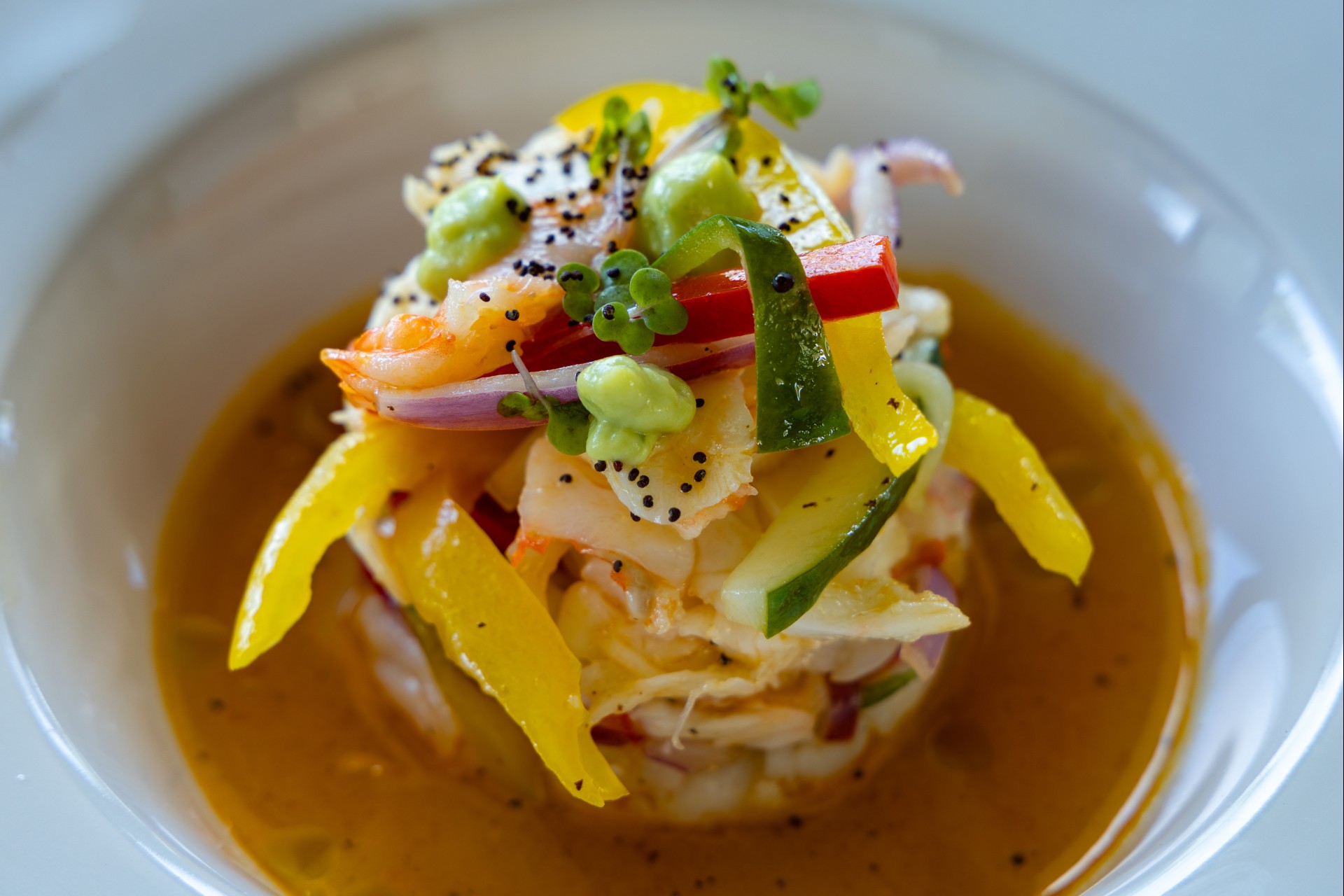 a bowl of food with vegetables