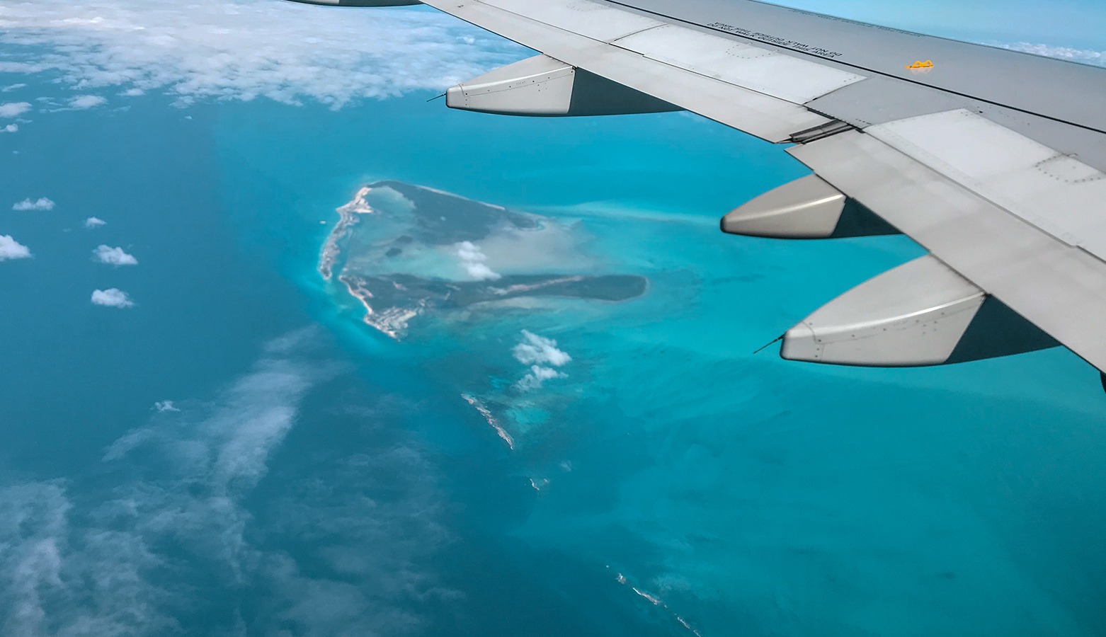 an airplane wing and an island