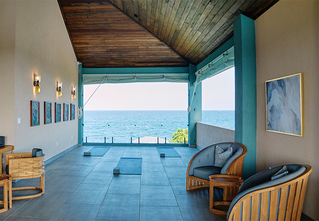a room with a view of the ocean